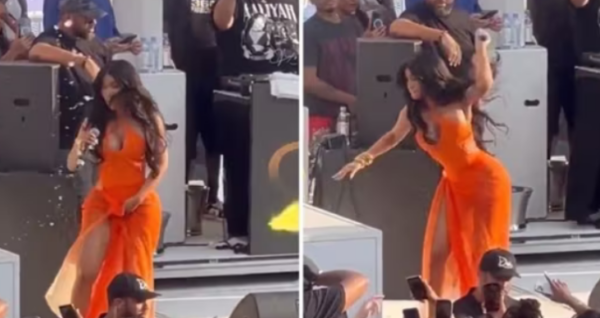 Cardi B’s microphone fling at a fan who threw a drink on stage goes viral.